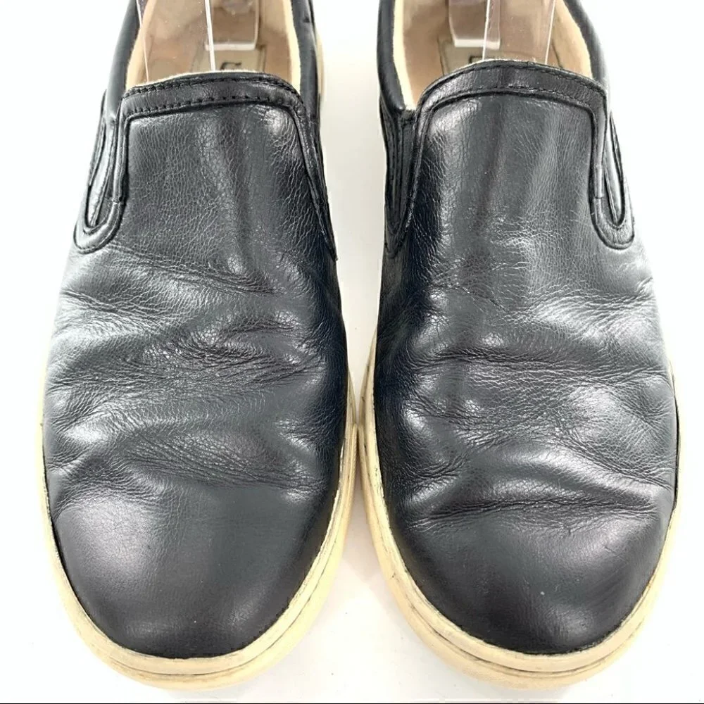 Ugg slip on sneakers size 8 39 black leather fleece wool lining flatforms